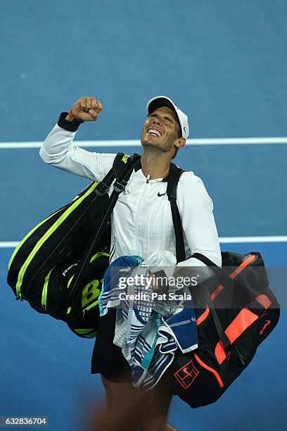 Rafael Nadal of Spain walks off court after winning match point in his semifinal match against Grigor Dimitrov of Bulgaria on day 12 of the 2017...