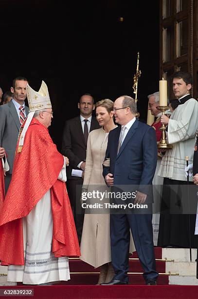 Prince Albert II of Monaco and Princess Charlene Of Monaco leave the Cathedral of Monaco after a mass during the ceremonies of the Sainte-Devote on...