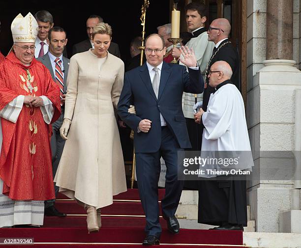 Prince Albert II of Monaco and Princess Charlene Of Monaco leave the Cathedral of Monaco after a mass during the ceremonies of the Sainte-Devote on...