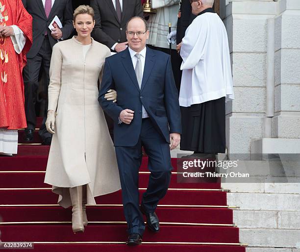 Prince Albert II of Monaco and Princess Charlene Of Monaco leave the Cathedral of Monaco after a mass during the ceremonies of the Sainte-Devote on...