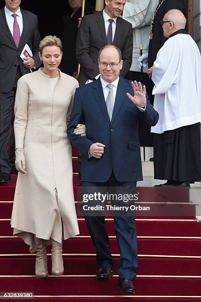 Prince Albert II of Monaco and Princess Charlene Of Monaco leave the Cathedral of Monaco after a mass during the ceremonies of the Sainte-Devote on...