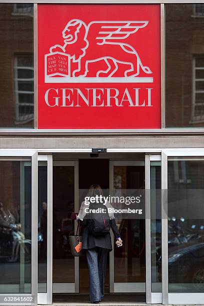 An employee enters Assicurazioni Generali SpA's offices in Rome, Italy, on Friday, Jan. 27, 2017. Intesa Sanpaolo SpA Chief Executive Officer Carlo...