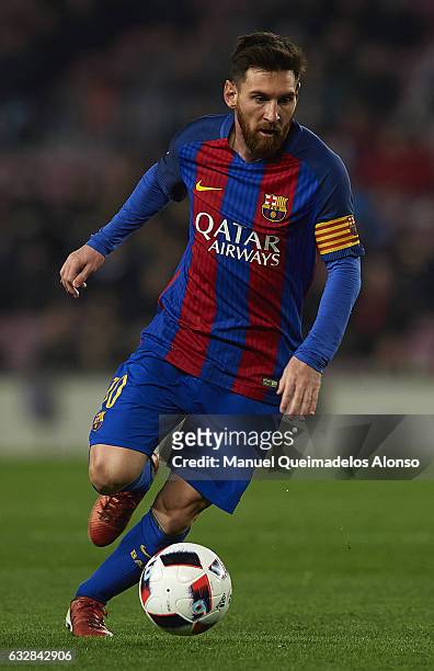Lionel Messi of Barcelona runs with the ball during the Copa del Rey quarter-final second leg match between FC Barcelona and Real Sociedad at Camp...