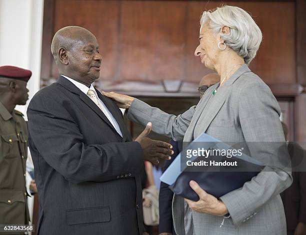 International Monetary Fund Managing Director Christine Lagarde is bid farewell by President of Uganda Yoweri Kaguta Museveni after their meeting at...