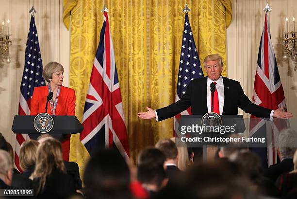President Donald Trump speaks during a joint press conference with British Prime Minister Theresa May in The East Room at The White House on January...
