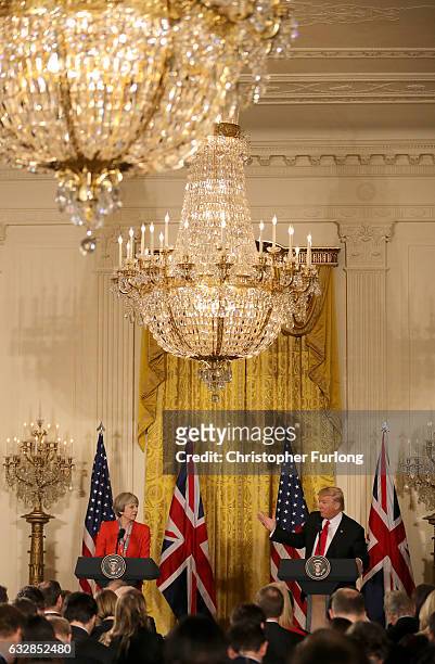 President Donald Trump speaks during a joint press conference with British Prime Minister Theresa May in The East Room at The White House on January...