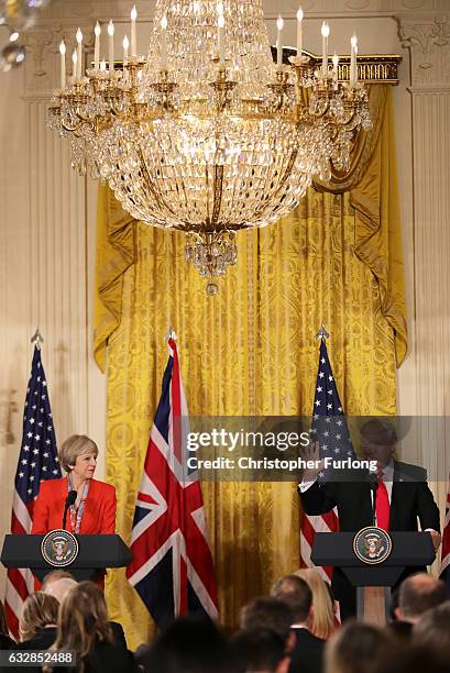 President Donald Trump speaks during a joint press conference with British Prime Minister Theresa May in The East Room at The White House on January...