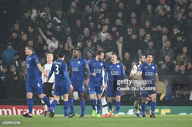 Leicester City's English striker Jamie Vardy celebrates with teammates after Derby scored an own goal during the English FA Cup fourth round football...