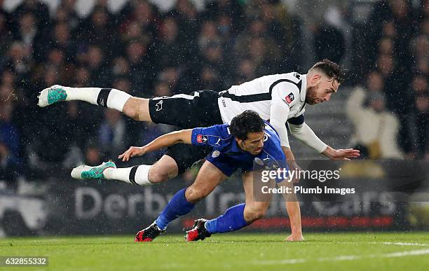 Shinji Okazaki of Leicester City in action with Richard Keogh of Derby County during the Emirates FA Cup Fourth Round tie between Derby County and...