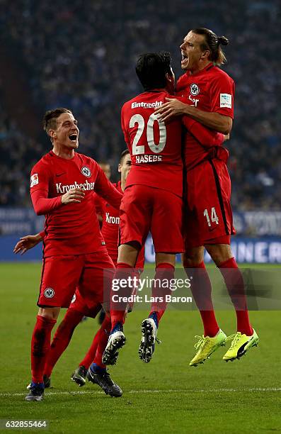 Alex Meier of Frankfurt celebrate with his team mates after scoring the opening goal during the Bundesliga match between FC Schalke 04 and Eintracht...