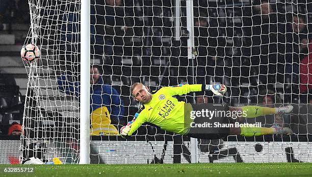 Kasper Schmeichel of Leicester City dives as Darren Bent of Derby County scores his sides first goal during The Emirates FA Cup Fourth Round match...