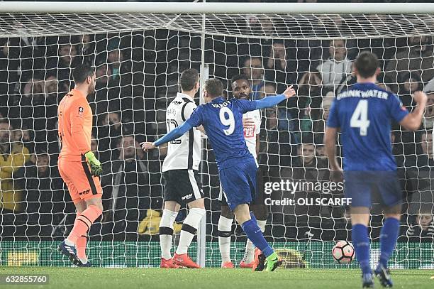 Leicester City's English striker Jamie Vardy reacts after Derby's English striker Darren Bent scores an own goal during the English FA Cup fourth...