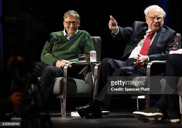 Bill Gates and Warren Buffett speak with journalist Charlie Rose at an event organized by Columbia Business School on January 27, 2017 in New York...