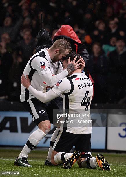 Derby's Scottish defender Craig Bryson celebrates with Derby's Scottish striker Johnny Russell after scoring their second goal during the English FA...