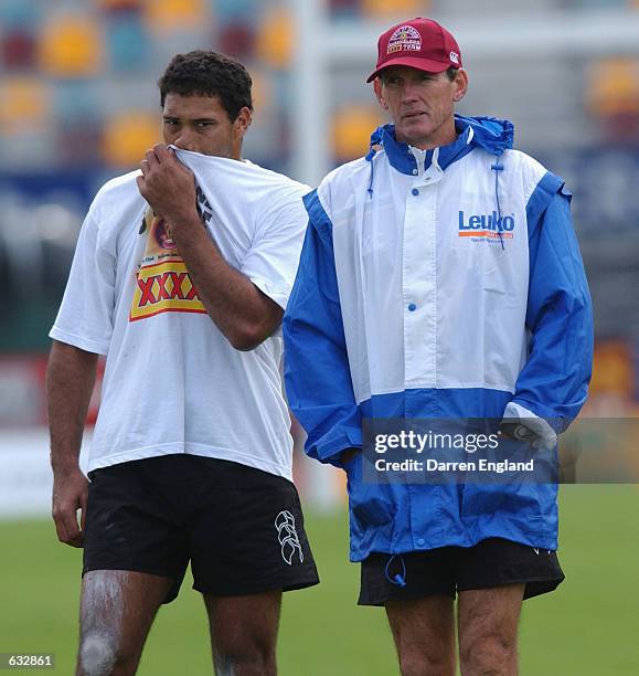 Justin Hodges talks to his coach Wayne Bennett of the Queensland NRL State of Origin during Queensland's final training session at ANZ Stadium in...