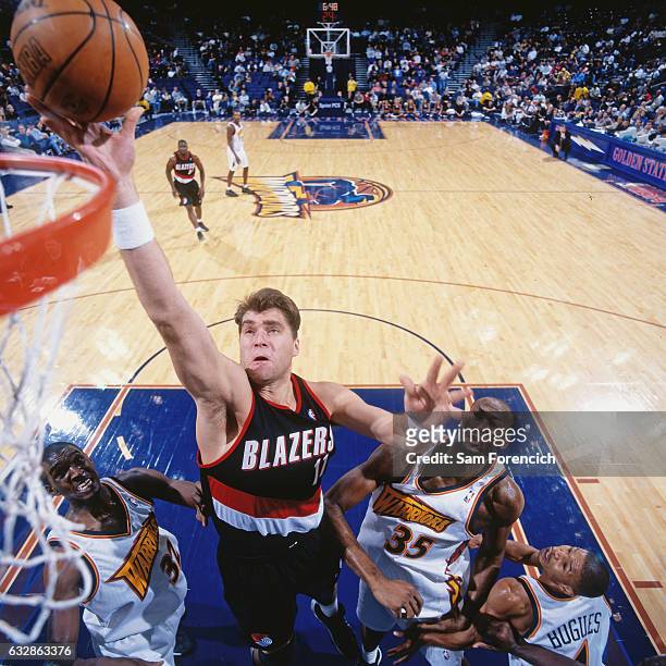 Arvydas Sabonis of the Portland Trail Blazers shoots against the Portland Trail Blazers during a game played on November 15, 1997 at the Arena in...