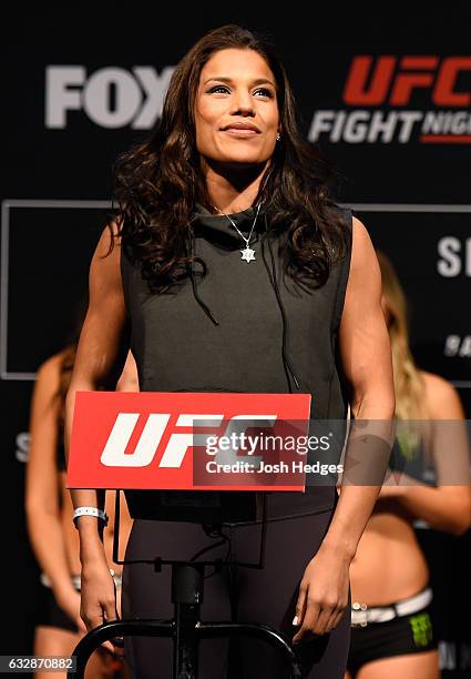 Julianna Pena poses on the scale during the UFC Fight Night weigh-in at the Pepsi Center on January 27, 2017 in Denver, Colorado.