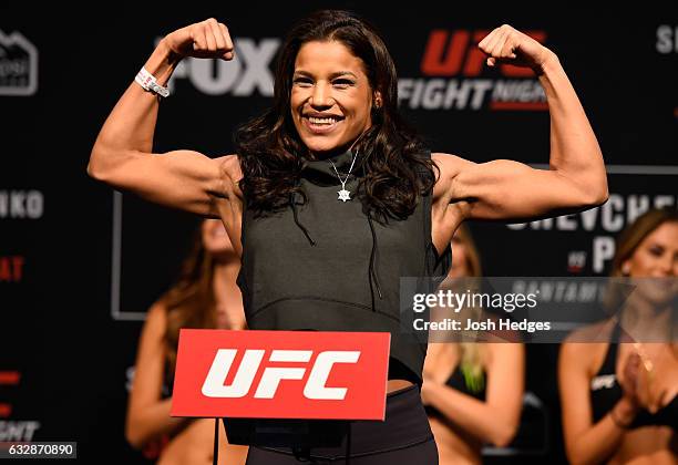 Julianna Pena poses on the scale during the UFC Fight Night weigh-in at the Pepsi Center on January 27, 2017 in Denver, Colorado.