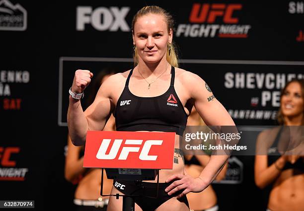 Valentina Shevchenko of Kyrgyzstan poses on the scale during the UFC Fight Night weigh-in at the Pepsi Center on January 27, 2017 in Denver, Colorado.