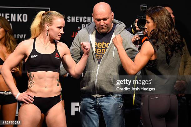 Valentina Shevchenko of Kyrgyzstan and Julianna Pena face off during the UFC Fight Night weigh-in at the Pepsi Center on January 27, 2017 in Denver,...