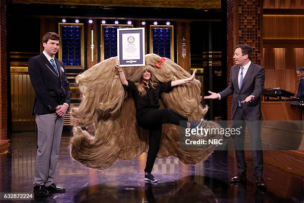 Episode 0612 -- Pictured: Actress Drew Barrymore and host Jimmy Fallon during Guinness World Records on January 27, 2017 --