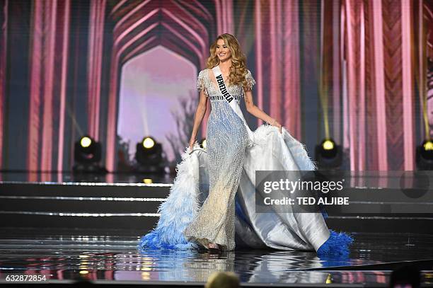 This photo taken on January 26, 2017 shows Miss Universe contestant Mariam Habach of Venezuela in her long gown during the preliminary competition of...