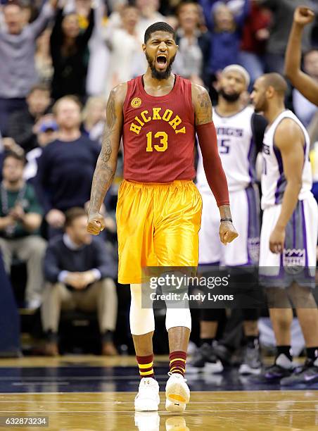 Paul George of the Indiana Pacers celebrates after making a basket during the game against the Sacramento Kings at Bankers Life Fieldhouse on January...