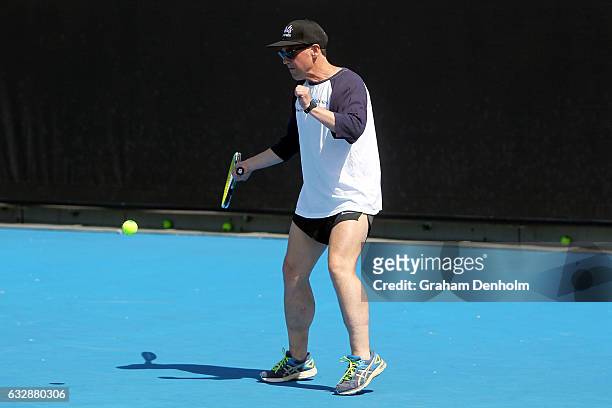 Federal Minister for Health and Minister for Sport Greg Hunt plays Cardio Tennis during day thirteen of the 2017 Australian Open at Melbourne Park on...