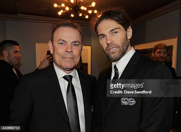 Current NHL player Jaromir Jagr, right, and former NHL player Adam Oates pose for a photo backstage during the NHL 100 presented by GEICO show as...