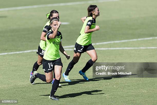 Camberra United's Ashleigh Sykes celebrates after scoring a penalty goal during the round 14 W-League match between Canberra United and Melbourne...