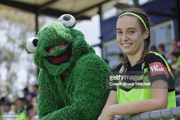 The Canberra United mascot and a young fan before the the round 14 W-League match between Canberra United and Melbourne Victory at McKellar Park on...