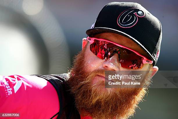 Doug Bollinger of the Sixers looks on from the team dug out during the Big Bash League match between the Perth Scorchers and the Sydney Sixers at...