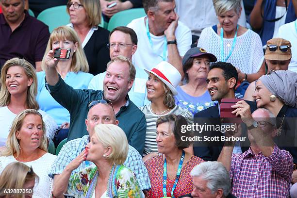 Peter Helliar, Waleed Aly and his wife Susan Carland attend the Women's Singles Final match between Venus Williams of the United States and Serena...