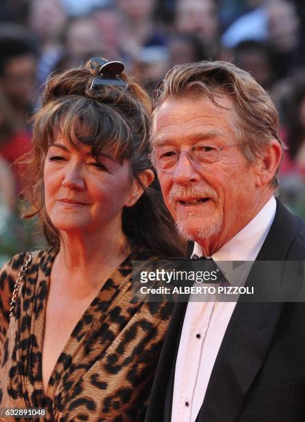 British actor John Hurt and his wife Anwen Rees Meyers arrive for the screening of "Tinker, Tailor, Soldier, Spy" at the 68th Venice Film Festival on...