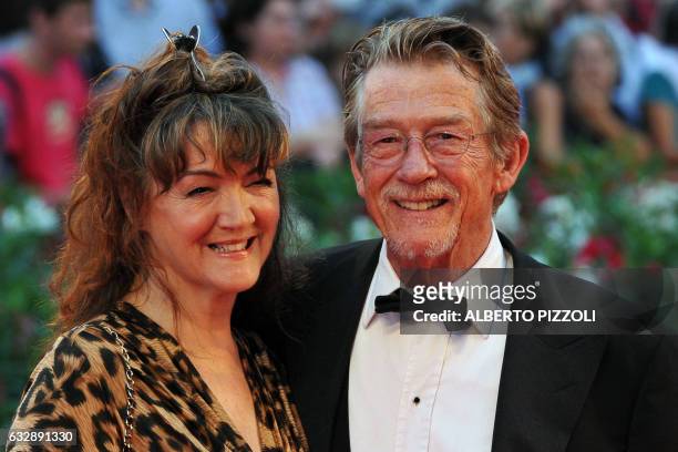 British actor John Hurt and his wife Anwen Rees Meyers arrive for the screening of "Tinker, Tailor, Soldier, Spy" at the 68th Venice Film Festival on...