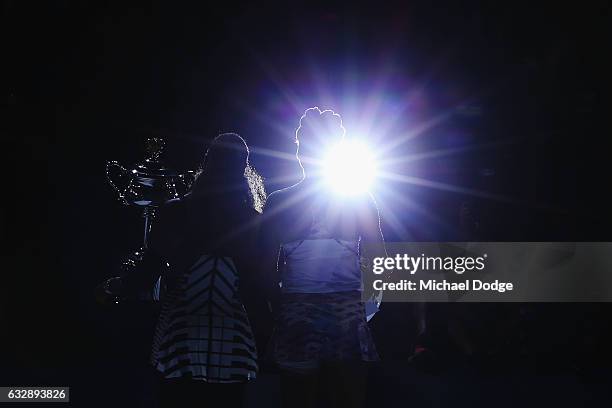 Serena Williams of the United States poses with the Daphne Akhurst Trophy after winning the Women's Singles Final against Venus Williams of the...