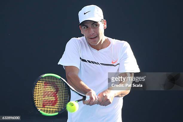 Yshai Oliel of Israel plays a backhand in his Junior Boys Singles Final against Zsombor Piros of Hungary during the Australian Open 2017 Junior...