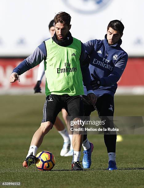 Sergio Ramos and Alvaro Morata of Real Madrid warm up during a training session at Valdebebas training ground on January 28, 2017 in Madrid, Spain.