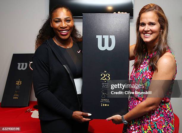 Serena Williams of the United States is presented with a special 23 Grand Slam Tennis Racket by Mary Joe Fernandez after winning the 2017 Women's...