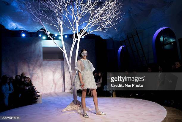 Model presents a creation from the Spring/Summer 2017 collection by Italian label Maison Gattinoni during the AltaRoma, in Rome, Italy, 27 January...