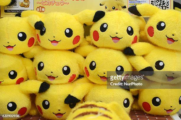 Stuffed Pikachu toys, a Pokemon fictional character, are piled at a game center in Tokyo, Japan, January 28, 2017.