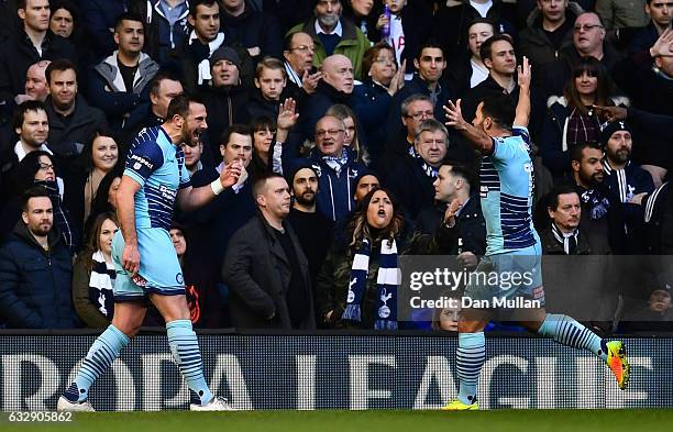 Paul Hayes of Wycombe Wanderers celebrates scoring the opening goal with his team mate Sam Wood during the Emirates FA Cup Fourth Round match between...