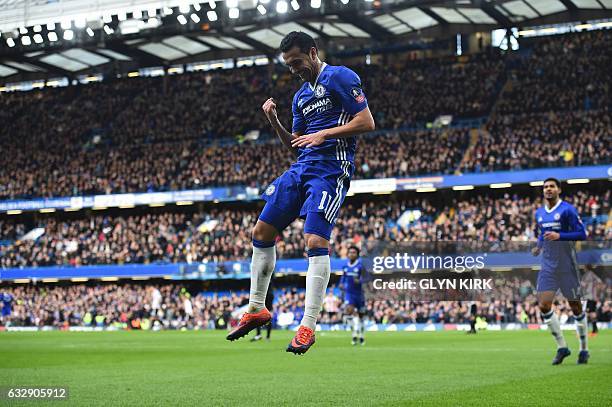 Chelsea's Spanish midfielder Pedro celebrates scoring their second goal during the English FA Cup fourth round football match between Chelsea and...