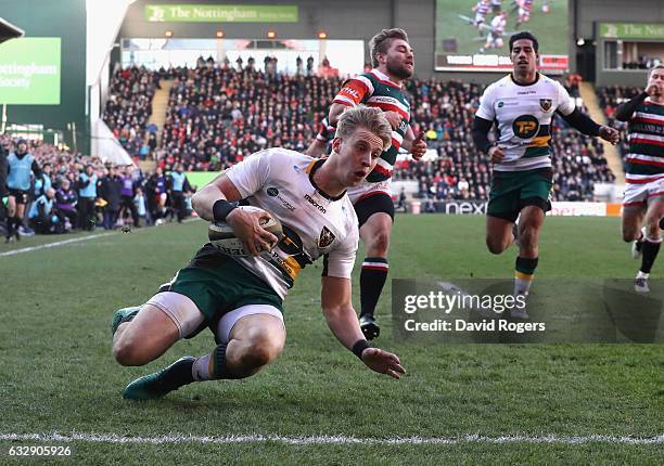 Harry Mallinder of Northampton dives over for a try during the Anglo-Welsh Cup match between Leicester Tigers and Northampton Saints at Welford Road...