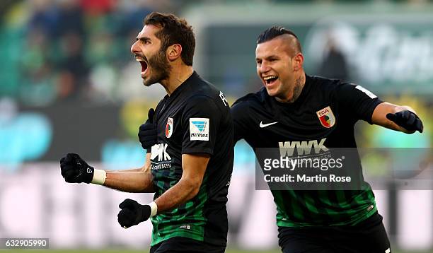 Halil Altintop of Augsburg celebrates after he scores the equalizing goal during the Bundesliga match between VfL Wolfsburg and FC Augsburg at...
