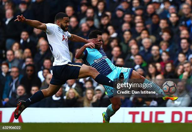 Sam Wood of Wycombe Wanderers and Cameron Carter-Vickers of Tottenham Hotspur compete for the ball during the Emirates FA Cup Fourth Round match...