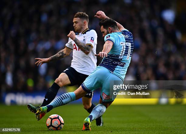 Sam Wood of Wycombe Wanderers and Kieran Trippier of Tottenham Hotspur compete for the ball during the Emirates FA Cup Fourth Round match between...