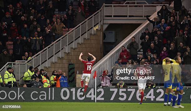 Middlesbrough's English midfielder Stewart Downing celebrates scoring his team's first goal during the English FA cup fourth round football match...