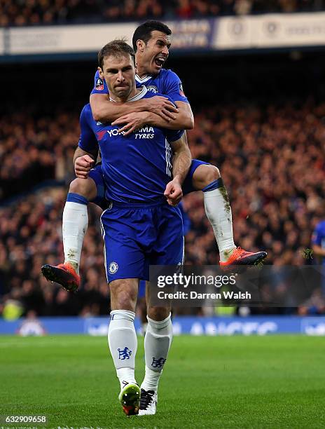 Branislav Ivanovic of Chelsea celebrates with Pedro of Chelsea after scoring his sides third goal the Emirates FA Cup Fourth Round match between...