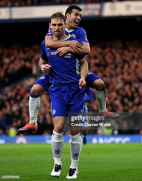 Branislav Ivanovic of Chelsea celebrates with Pedro of Chelsea after scoring his sides third goal the Emirates FA Cup Fourth Round match between...